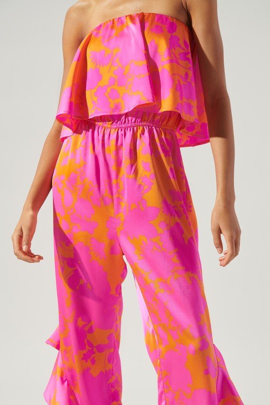 FUN FLORAL STRAPLESS JUMPSUIT featuring vibrant fuchsia and orange, perfect for summer outfits Texas from Raggdoll Boutique.