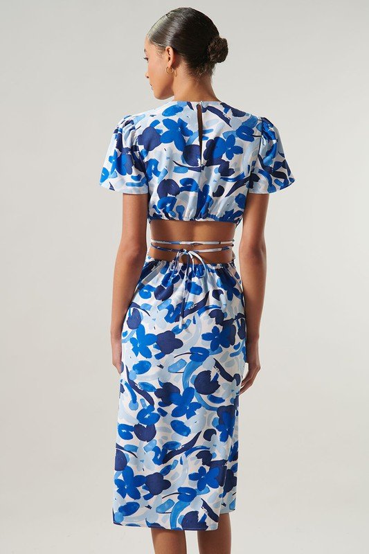 Back view of MONET FLOWER SHOWER DRESS showcasing trendy coastal style from Raggdoll Boutique.