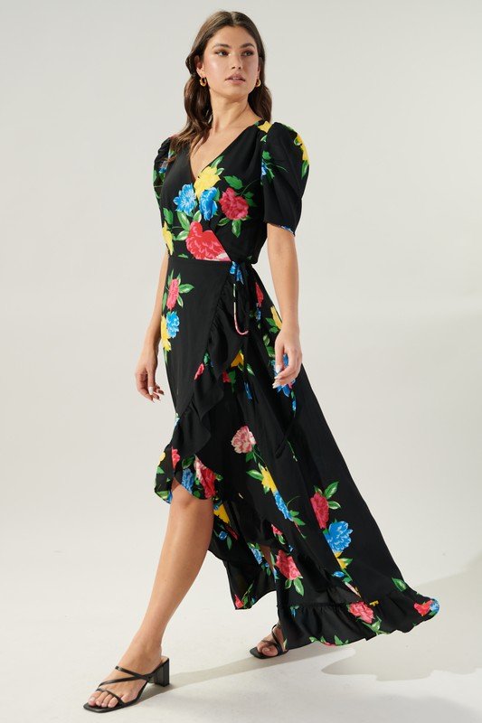 VACATION MODE DRESS showcasing floral design, perfect for a trendy coastal style at Raggdoll Boutique.
