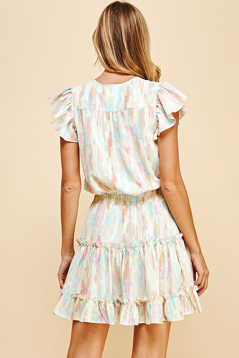 Stylish watercolor dress from a coastal boutique, perfect for tropical vacations and curvy plus size fashion.