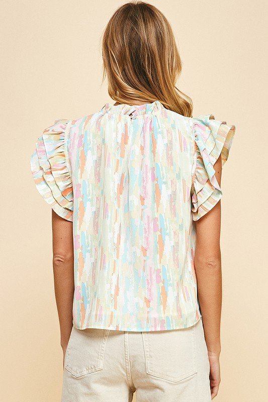 Stylish women's WATER COLORS TOP with ruffled sleeves, perfect for summer outfits Texas from Raggdoll Boutique.