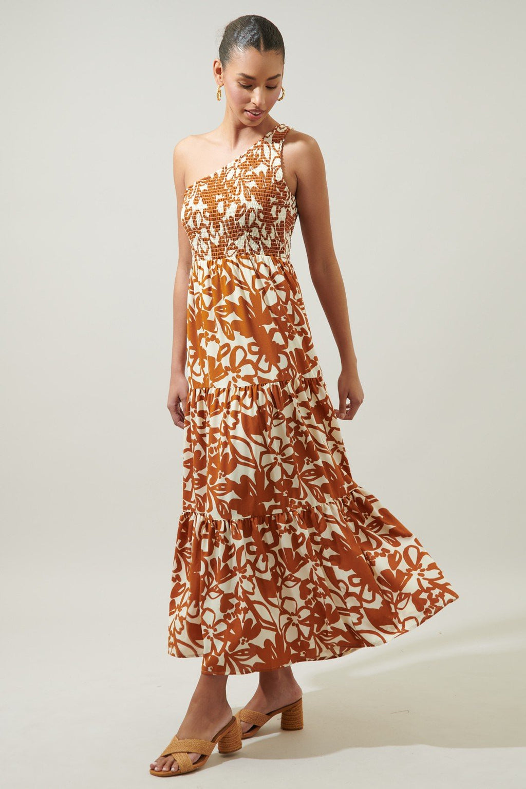 MARIDA CARAMEL FLORAL ONE SHOULDER DRESS showcasing trendy coastal style at Raggdoll Boutique.