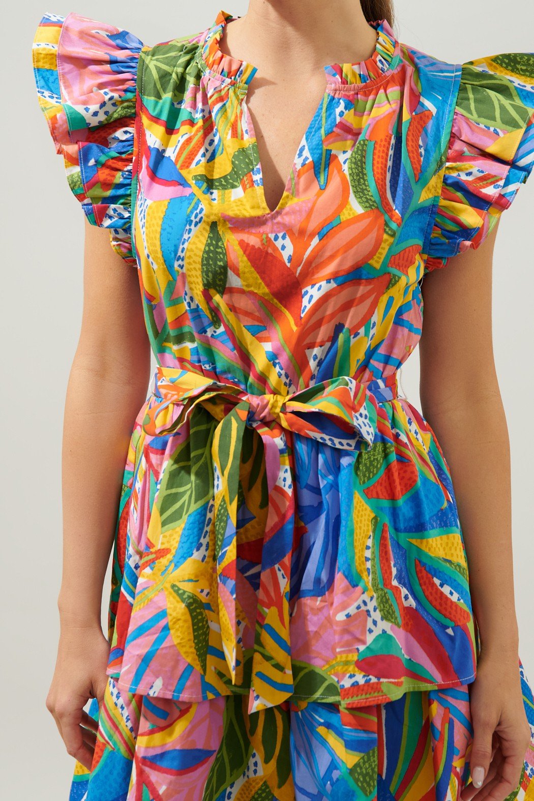 WALKING ON SUNSHINE DRESS featuring vibrant colors and ruffled sleeves, perfect for summer outfits Texas at Raggdoll Boutique.