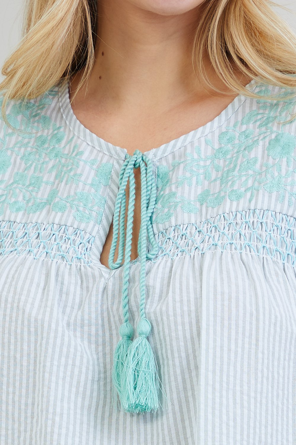 Mint floral embroidered striped top, perfect for coastal boutique clothing and tropical vacation dresses.