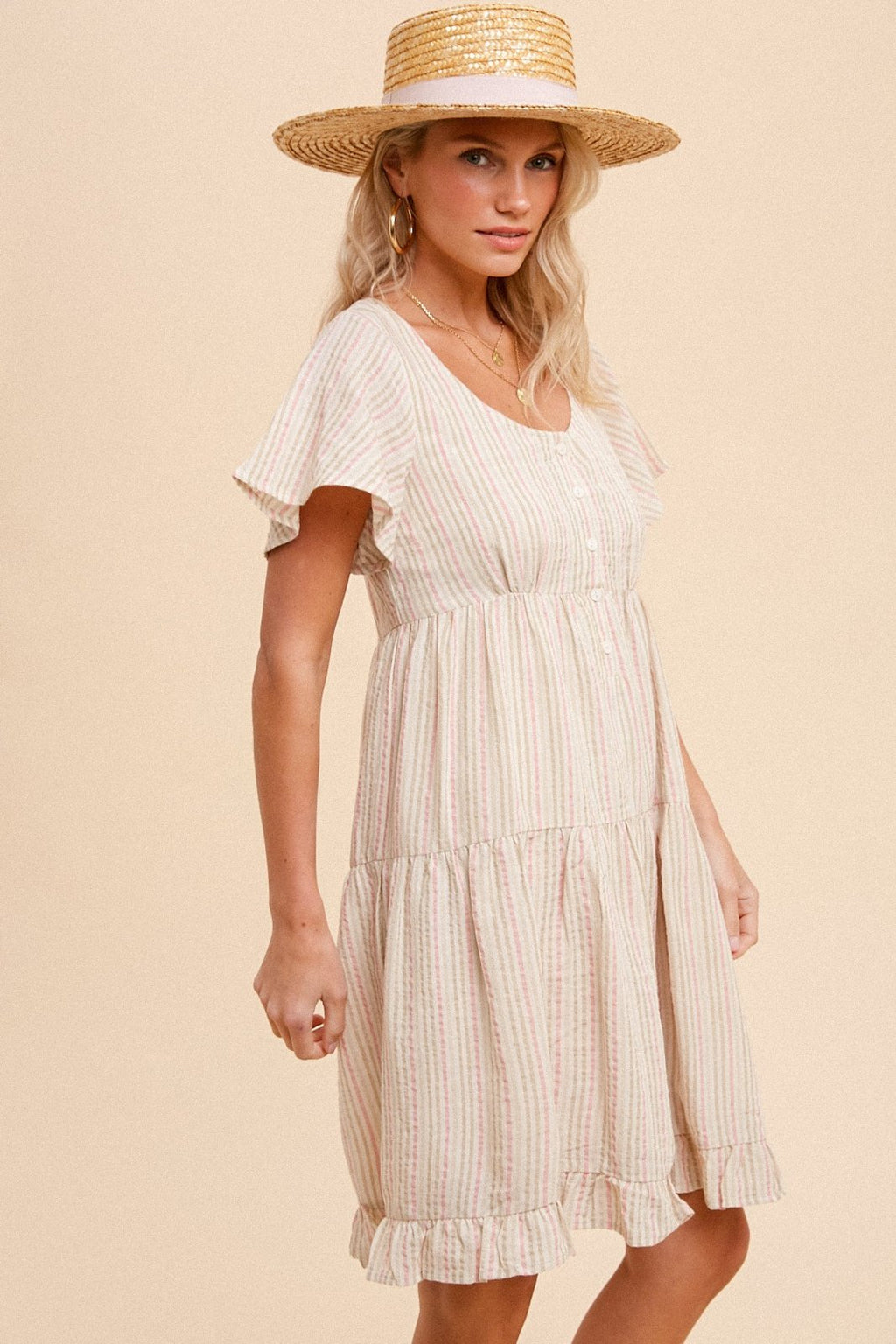 HEM & THREAD TIERED BABYDOLL MINI DRESS worn with a straw hat, perfect for summer outfits Texas from Raggdoll Boutique.