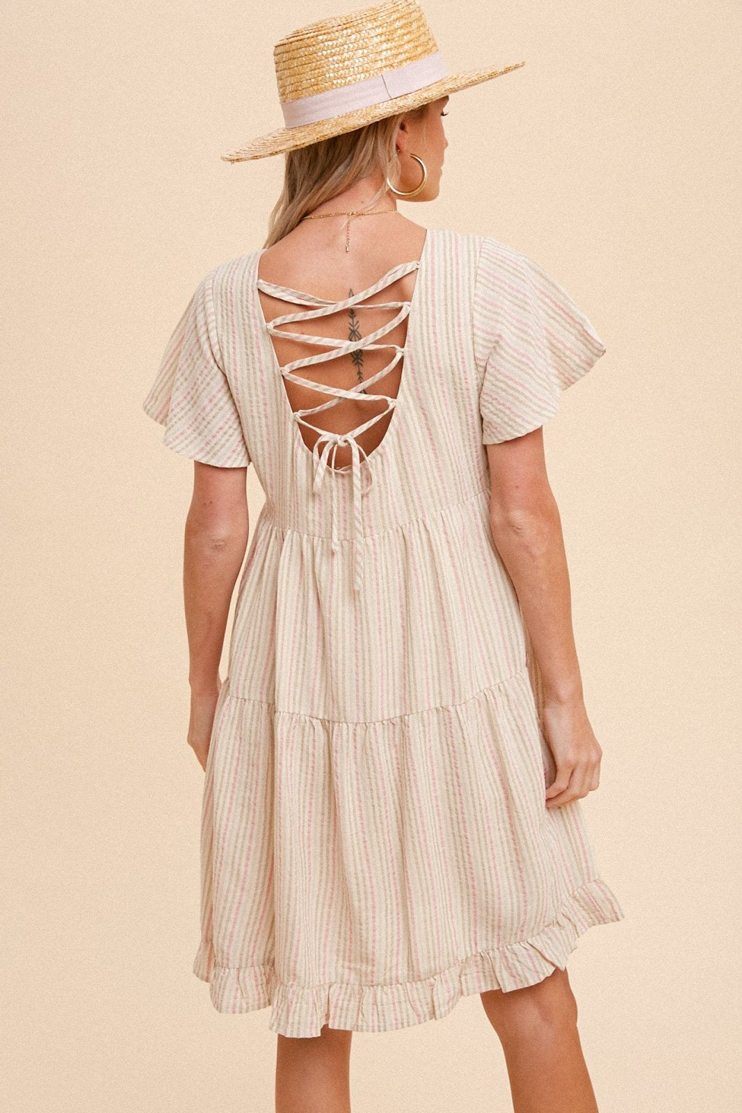 HEM & THREAD TIERED BABYDOLL MINI DRESS with a lace-up back, perfect for trendy coastal style and summer outfits Texas.