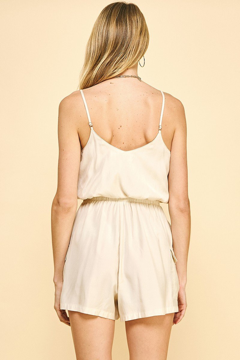 Back view of Oyster Sleeveless Romper from Raggdoll Boutique, perfect for trendy coastal style and summer outfits Texas.