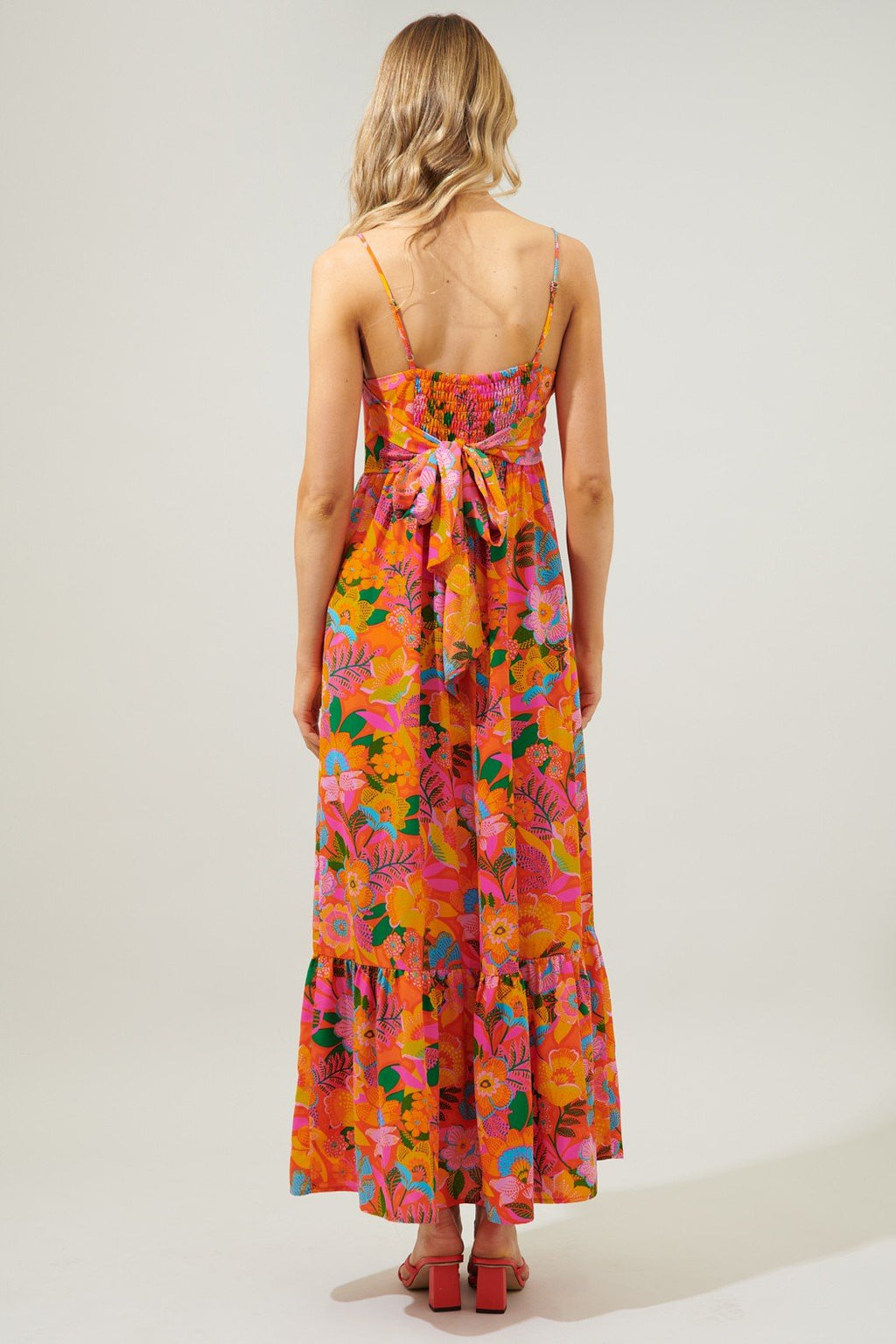 IDALIA TIE BACK MAXI DRESS in vibrant floral print, showcasing a back bow tie and ruffle tier hem, perfect for summer outfits.