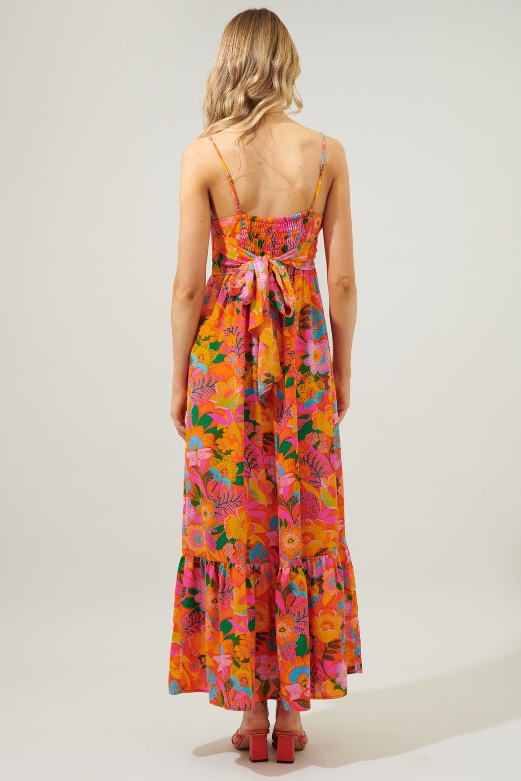 IDALIA TIE BACK MAXI DRESS in vibrant floral print, showcasing a back bow tie and ruffle tier hem, perfect for summer outfits.