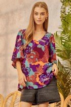 MAGENTA AND TURQUOISE PRINT TOP from Raggdoll Boutique, perfect for summer outfits in Port Aransas.