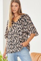 PRETTY BLACK MOCHA BLOUSE from Raggdoll Boutique, a trendy coastal style for summer outfits in Texas.