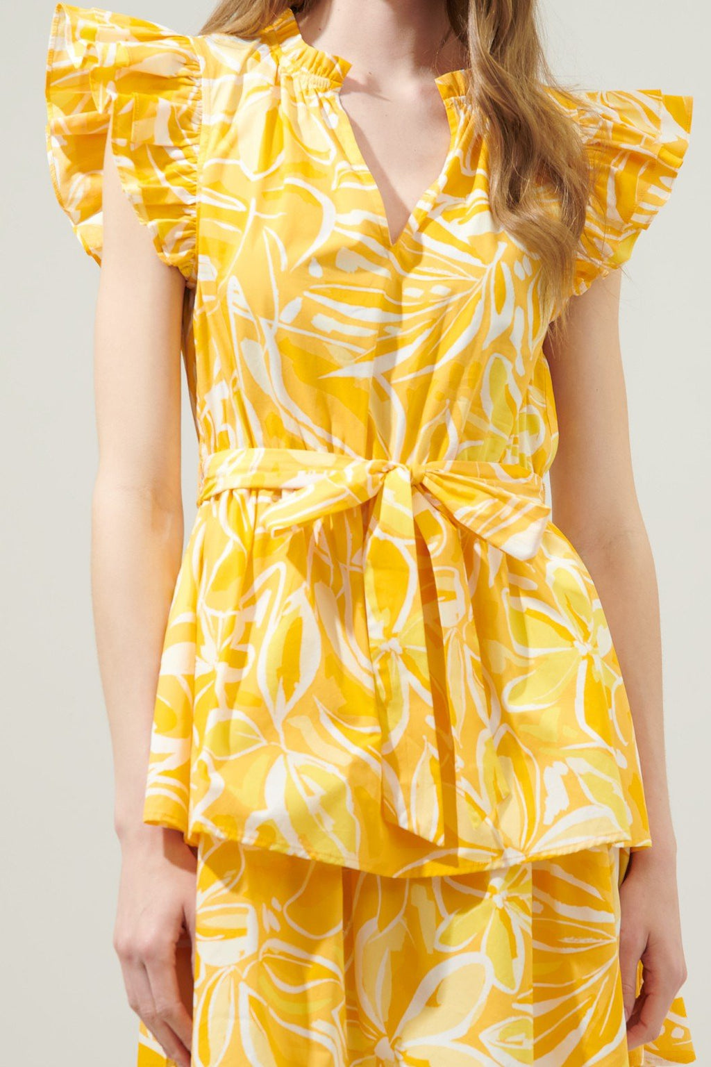 WALKING ON SUSNSHINE DRESS from Raggdoll Boutique, featuring vibrant yellow floral design, perfect for summer outfits Texas.