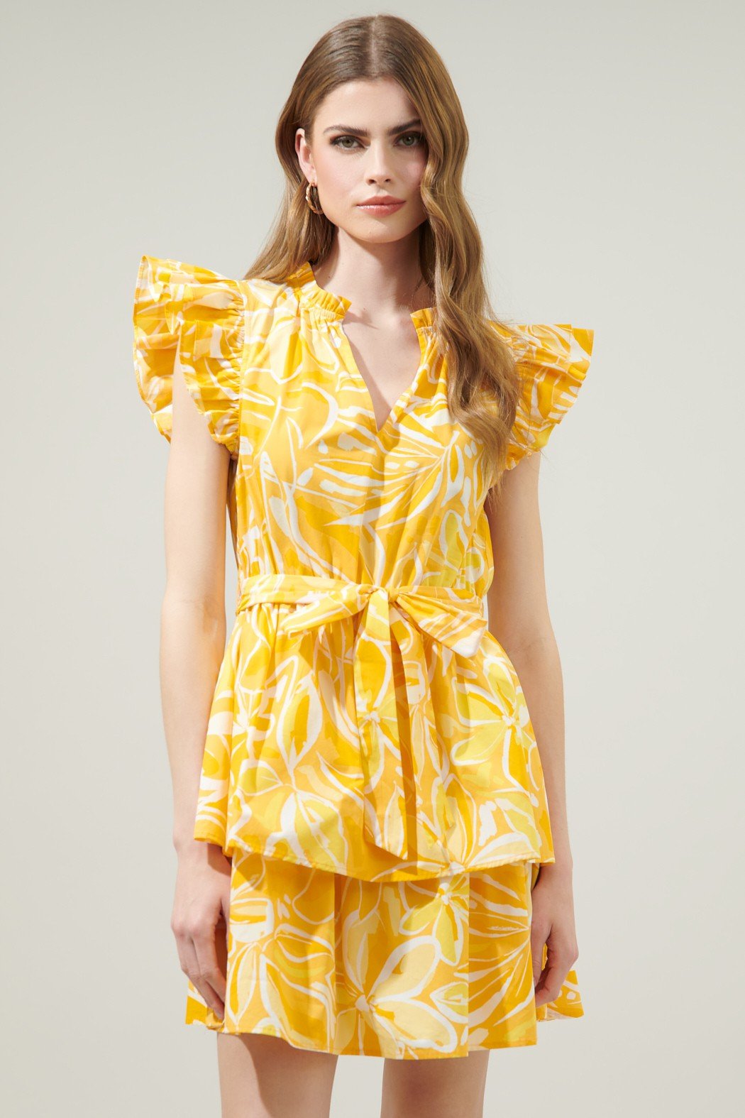 WALKING ON SUSNSHINE DRESS styled with ruffled sleeves, perfect for summer outfits Texas from Raggdoll Boutique.