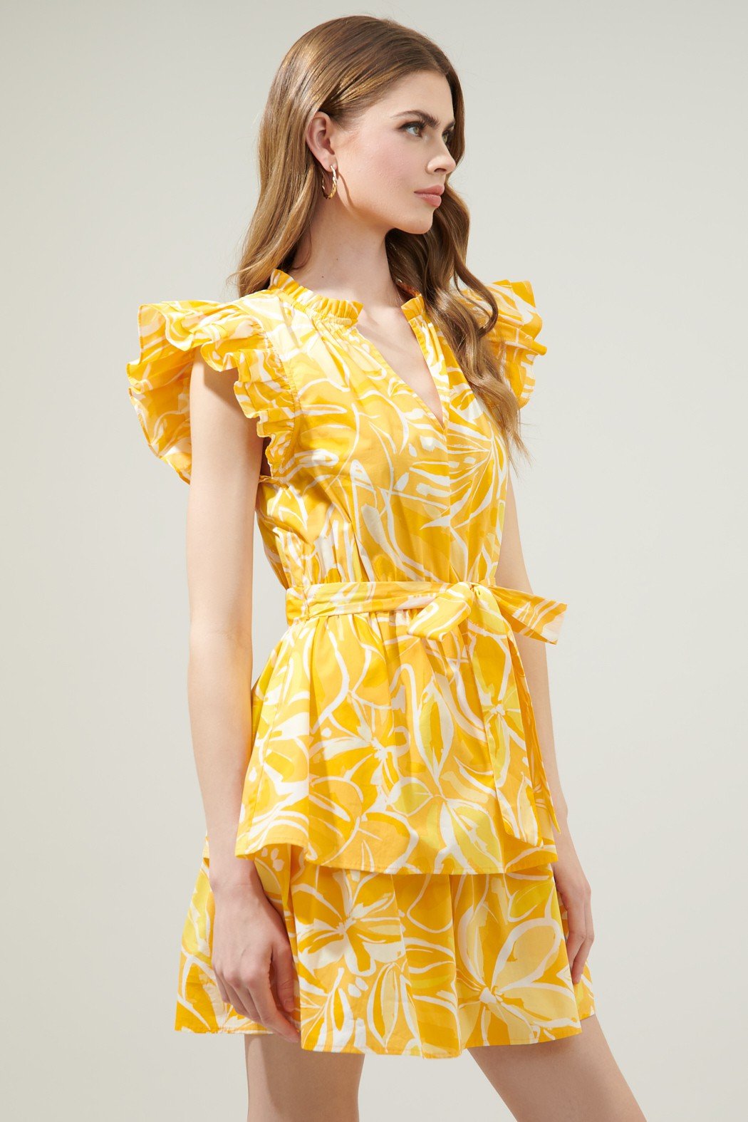 WALKING ON SUSNSHINE DRESS from Raggdoll Boutique featuring a vibrant yellow floral design, perfect for summer outfits Texas.