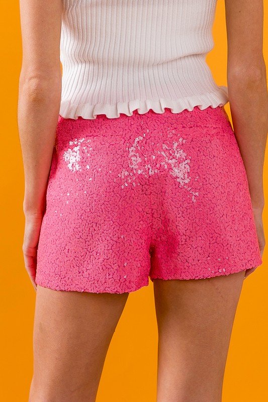 BARBIE PINK SEQUIN SHORTS shown from the back, perfect for summer outfits Texas and coastal fashion boutique.