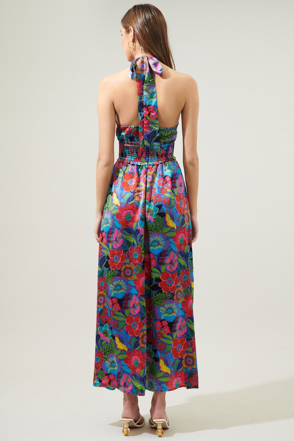 Back view of the IN THE TROPICS DRESS featuring vibrant floral print and halter neckline, perfect for summer outfits Texas.