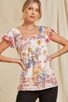 Savanna Jane top with tassels available at Raggdoll Boutique, perfect for trendy coastal style and summer outfits.