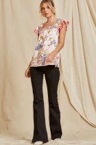 Savanna Jane top with tassels displayed in a coastal boutique style, perfect for summer outfits Texas.