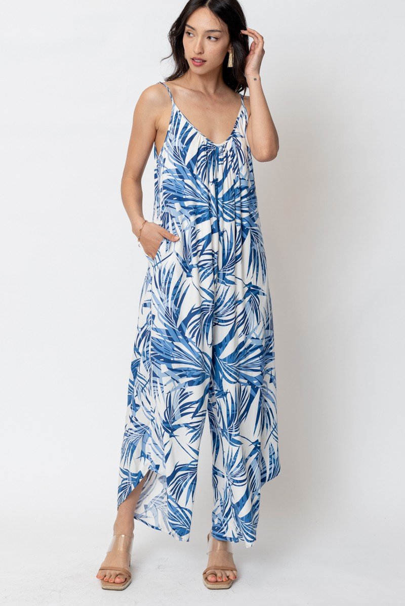 Tropical Paradise Jumpsuit with blue palm leaf design, perfect for summer outfits Texas at Raggdoll Boutique.
