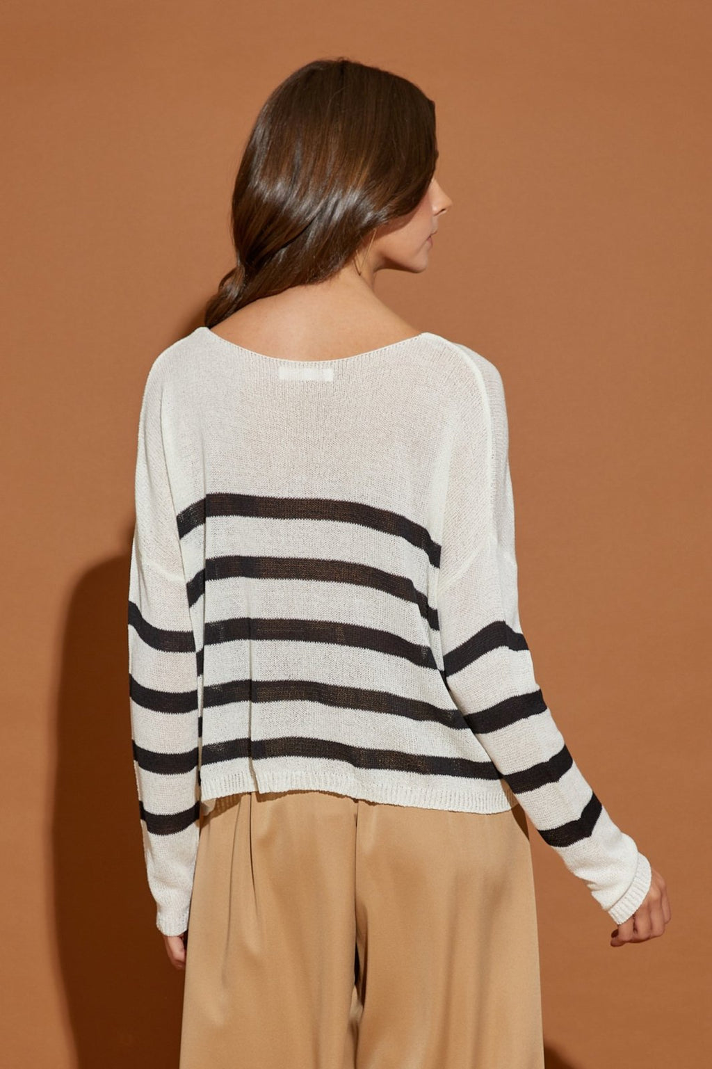 Striped Knitted Pullover from Raggdoll Boutique, perfect for coastal fashion and summer outfits in Port Aransas.
