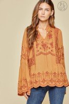 RUST EMBELLISHED BELL SLEEVE TOP showcasing beautiful embroidery, perfect for trendy coastal style from Raggdoll Boutique.