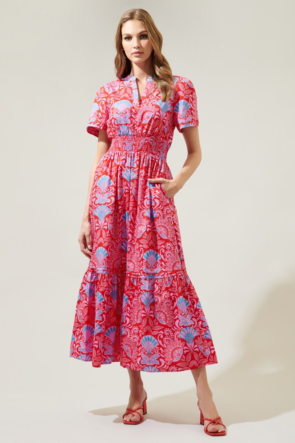 Pretty as a Picture dress from Raggdoll Boutique featuring vibrant colors and a trendy coastal style.