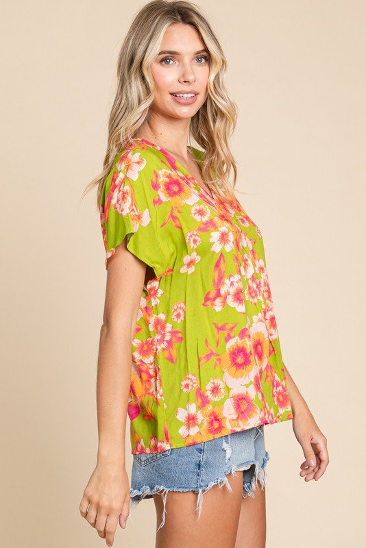 Allie Top with vibrant floral design, perfect for summer outfits Texas from Raggdoll Boutique.