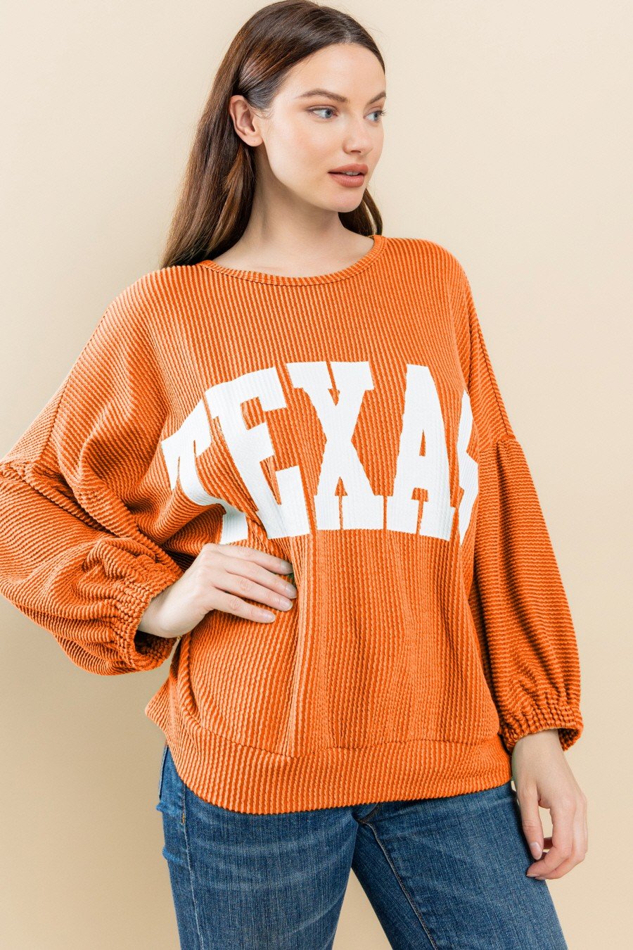 BURNT ORANGE TEXAS ROUND NECK PUFF SLEEVE oversized sweatshirt from Raggdoll Boutique in Port Aransas.