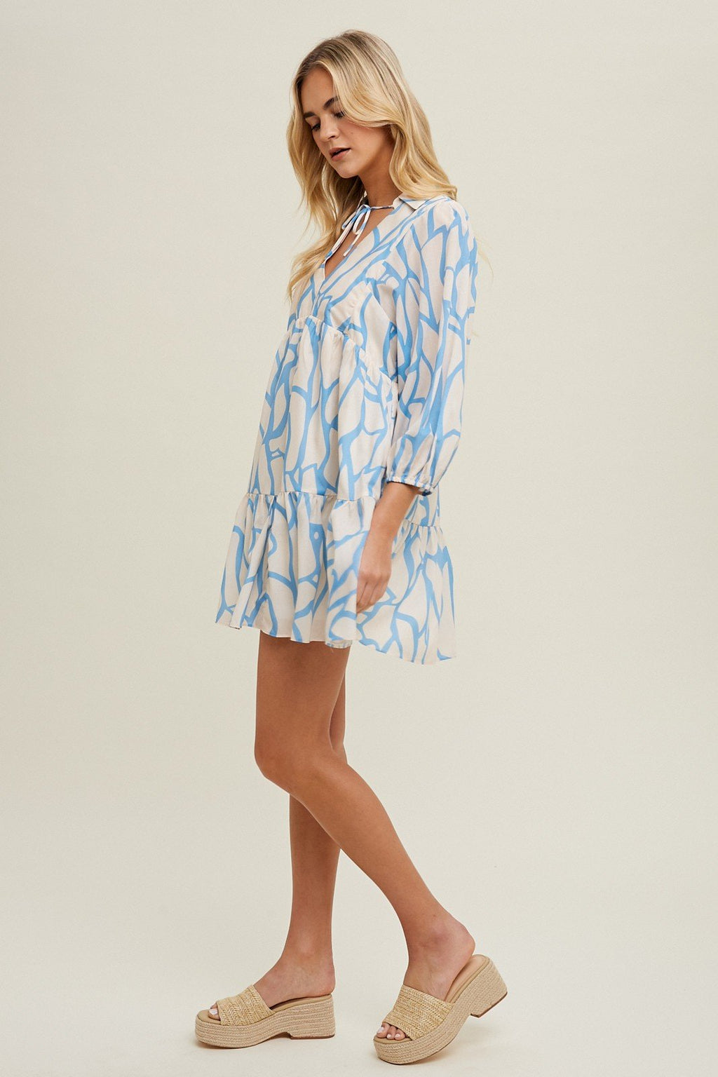 Sky Blue Abstract Mini Dress from Raggdoll Boutique, perfect for summer outfits and coastal fashion in Port Aransas.