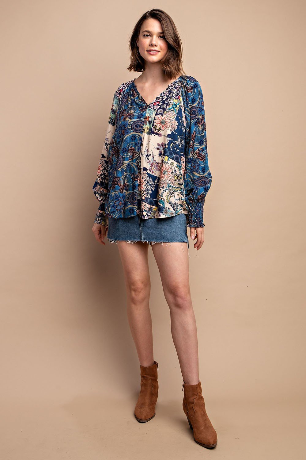 Stylish Midnight Multi-Print Button Up Top at coastal boutique clothing, perfect with denim shorts for a tropical vacation look.