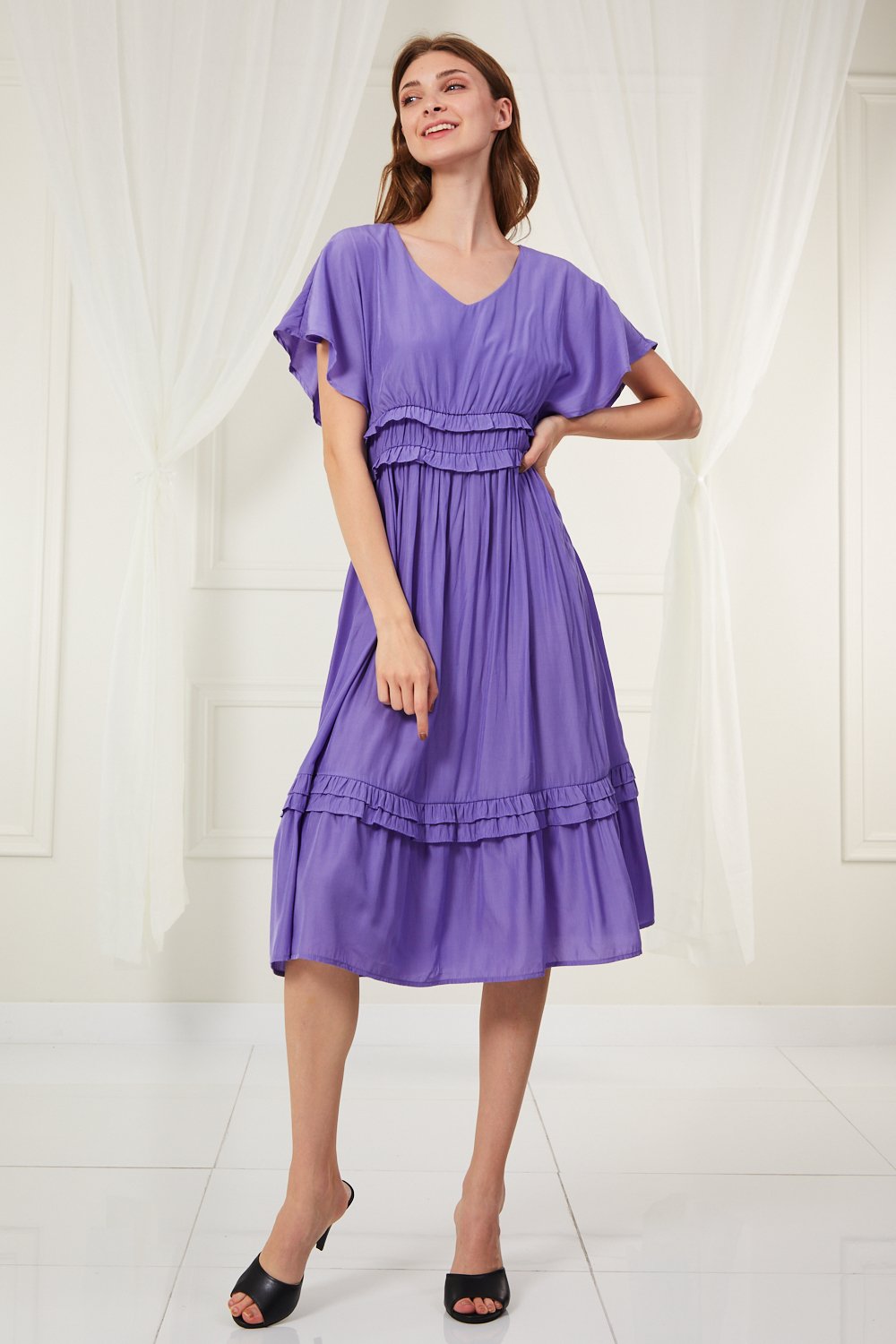 SIMPLE ROMANCE PURPLE DRESS from Raggdoll Boutique featuring tiered frilled detail and butterfly sleeves.