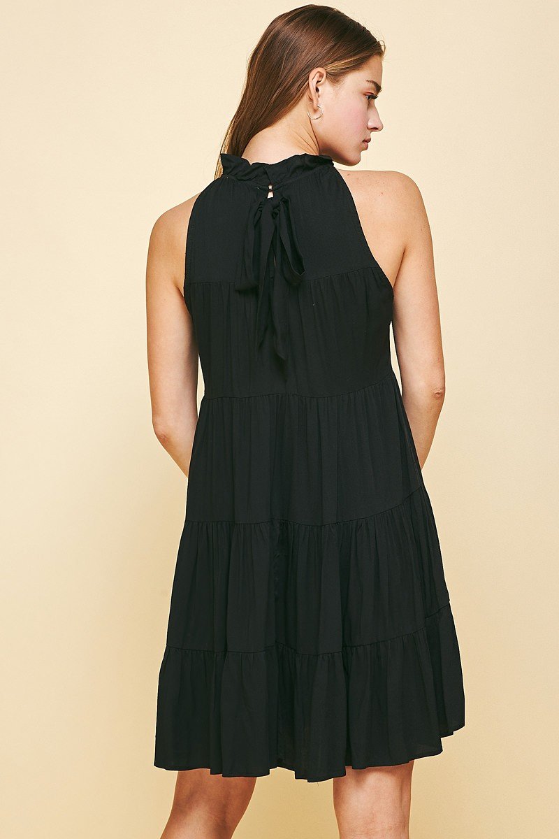 Becky Dress with back bow detail from coastal boutique, perfect for tropical vacation and stylish women's fashion.