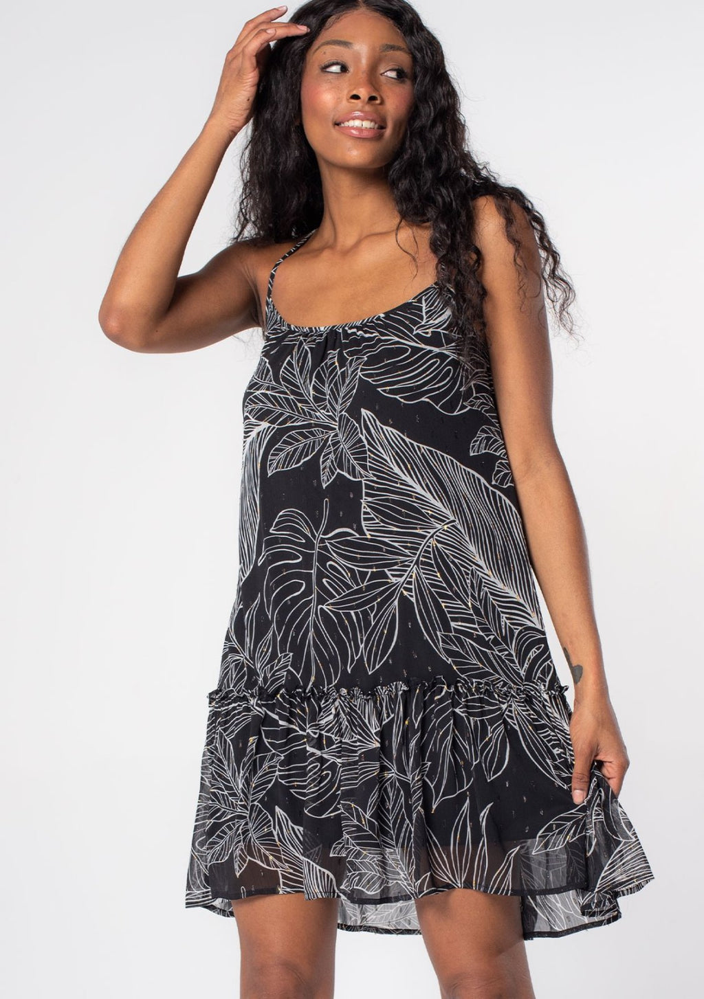 Marley Dress featuring a tropical leaf design, perfect for coastal boutique clothing and beach outings in Port Aransas.