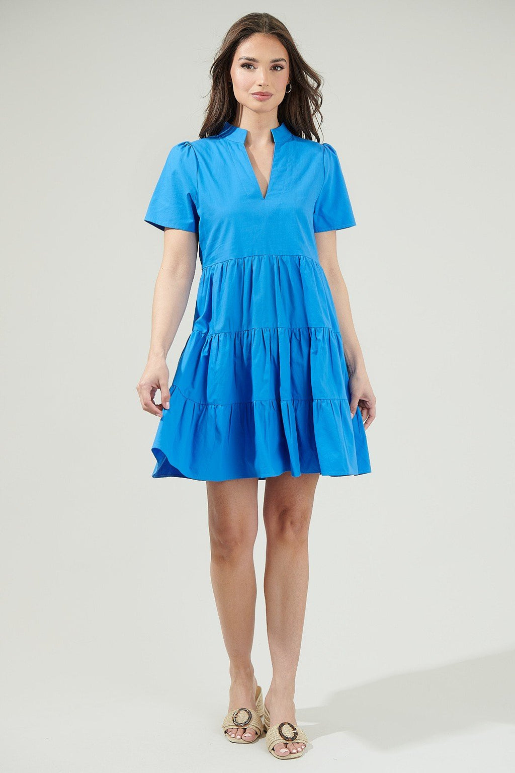 Daytona Bay Dress in bright blue, featuring a split neckline and tiered skirt, perfect for summer outfits Texas.
