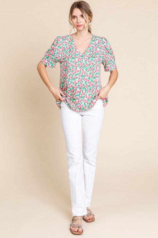 Cora Top floral blouse with short sleeves; stylish women's fashion for tropical vacations and beach outings at Port Aransas boutique.