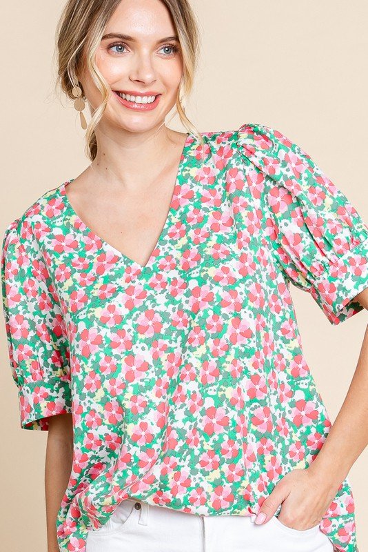 Cora Top from coastal boutique clothing, featuring floral print. Perfect for beach dresses and stylish tops for women.