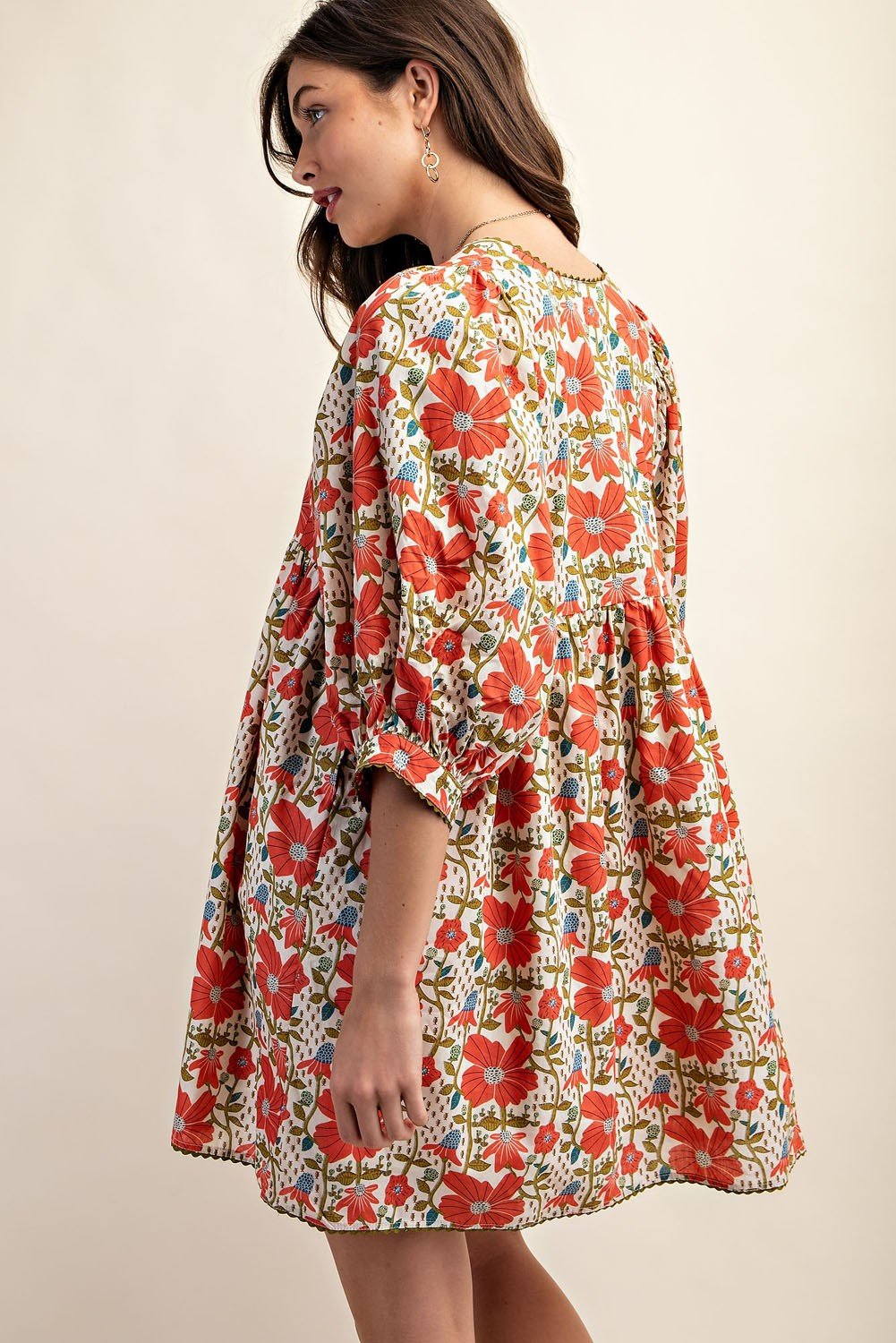 Paige Dress in vibrant floral print, perfect for tropical vacations. Ideal beach dress from Port Aransas boutique, 100% cotton.