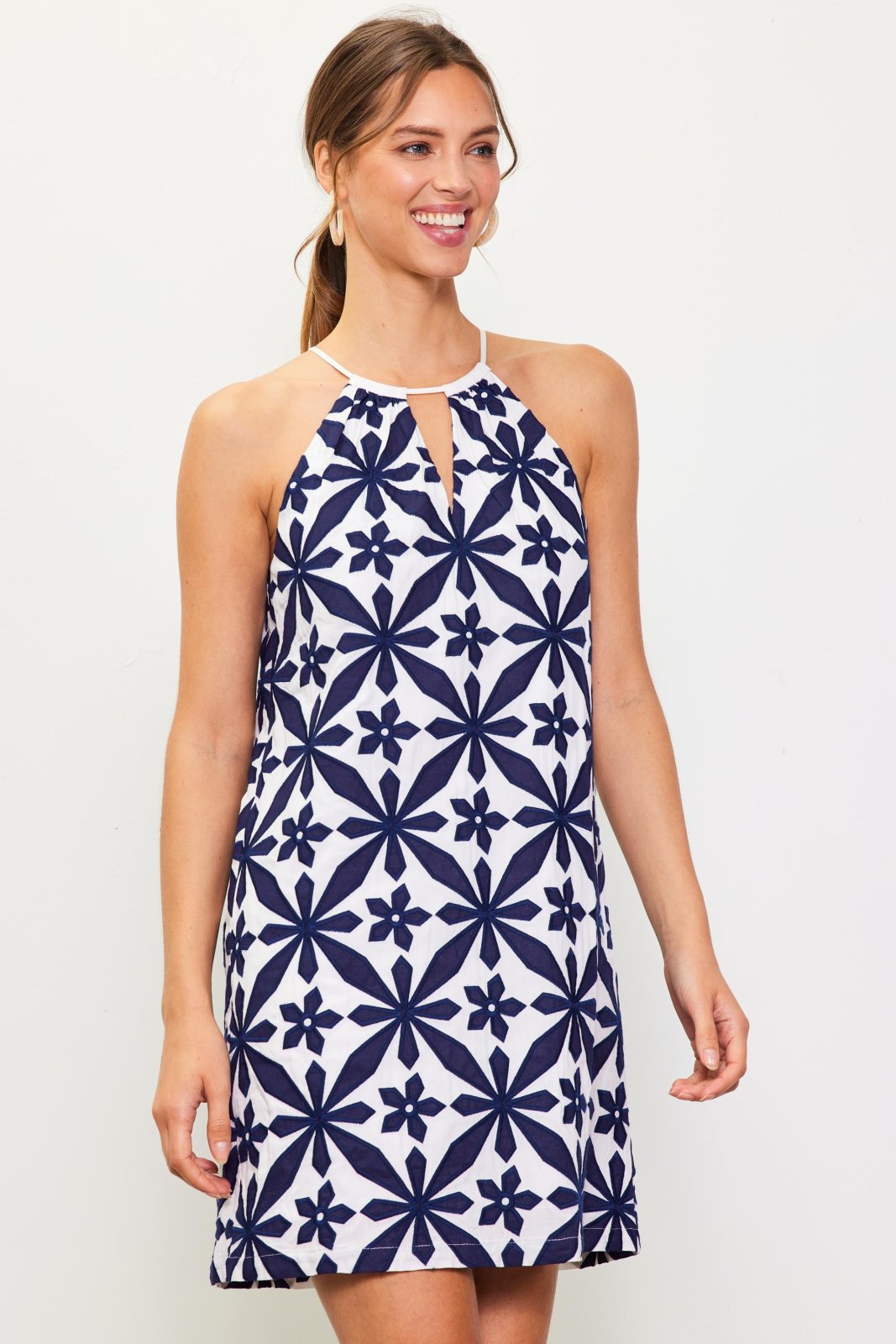 Hope Dress: Embroidered halter dress perfect for coastal boutique clothing and beach vacations, designed for stylish women.
