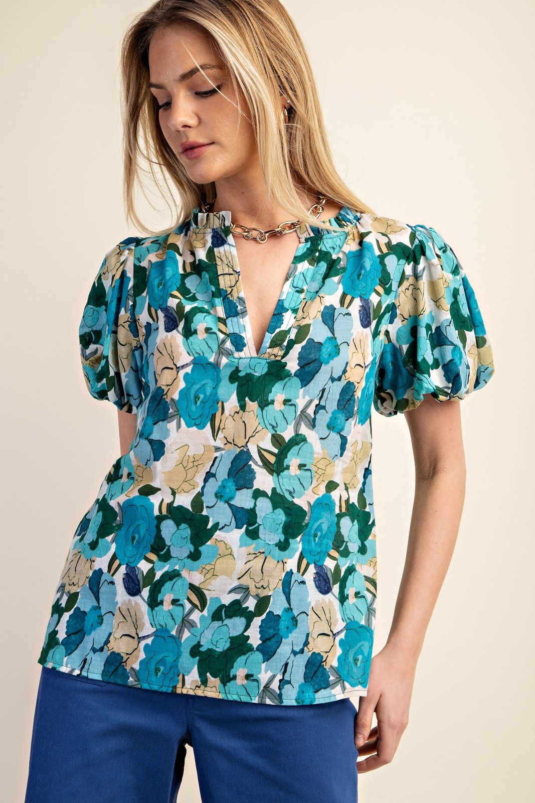 Vicky Plus Floral Top featuring vibrant blue and floral patterns, perfect for coastal boutique clothing and tropical vacations.