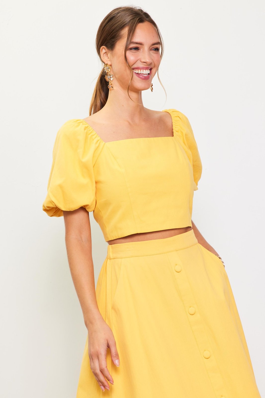 Sunflower top with open back detail, perfect for coastal boutique clothing and beach dresses at our Port Aransas boutique.