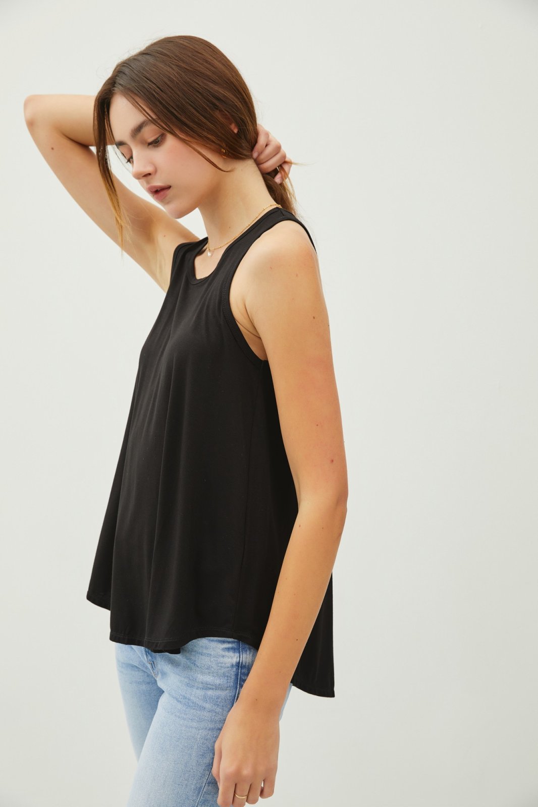 BLACK FLOWY TANK TOP from Raggdoll Boutique, perfect for summer outfits Texas and coastal fashion.