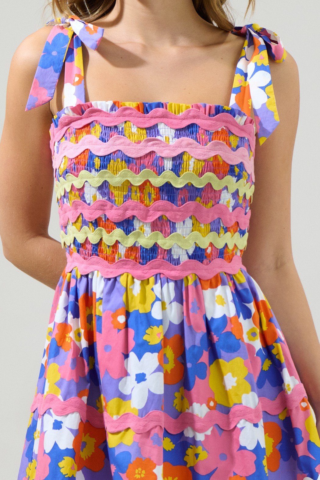 Happy Days Dress with colorful floral patterns and self-tie straps, perfect for summer outfits Texas at Raggdoll Boutique.