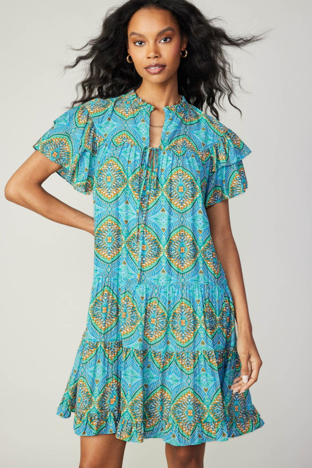 Lydia Dress in bright blue with ruffled sleeves from Raggdoll Boutique, perfect for trendy coastal style and summer outfits Texas.