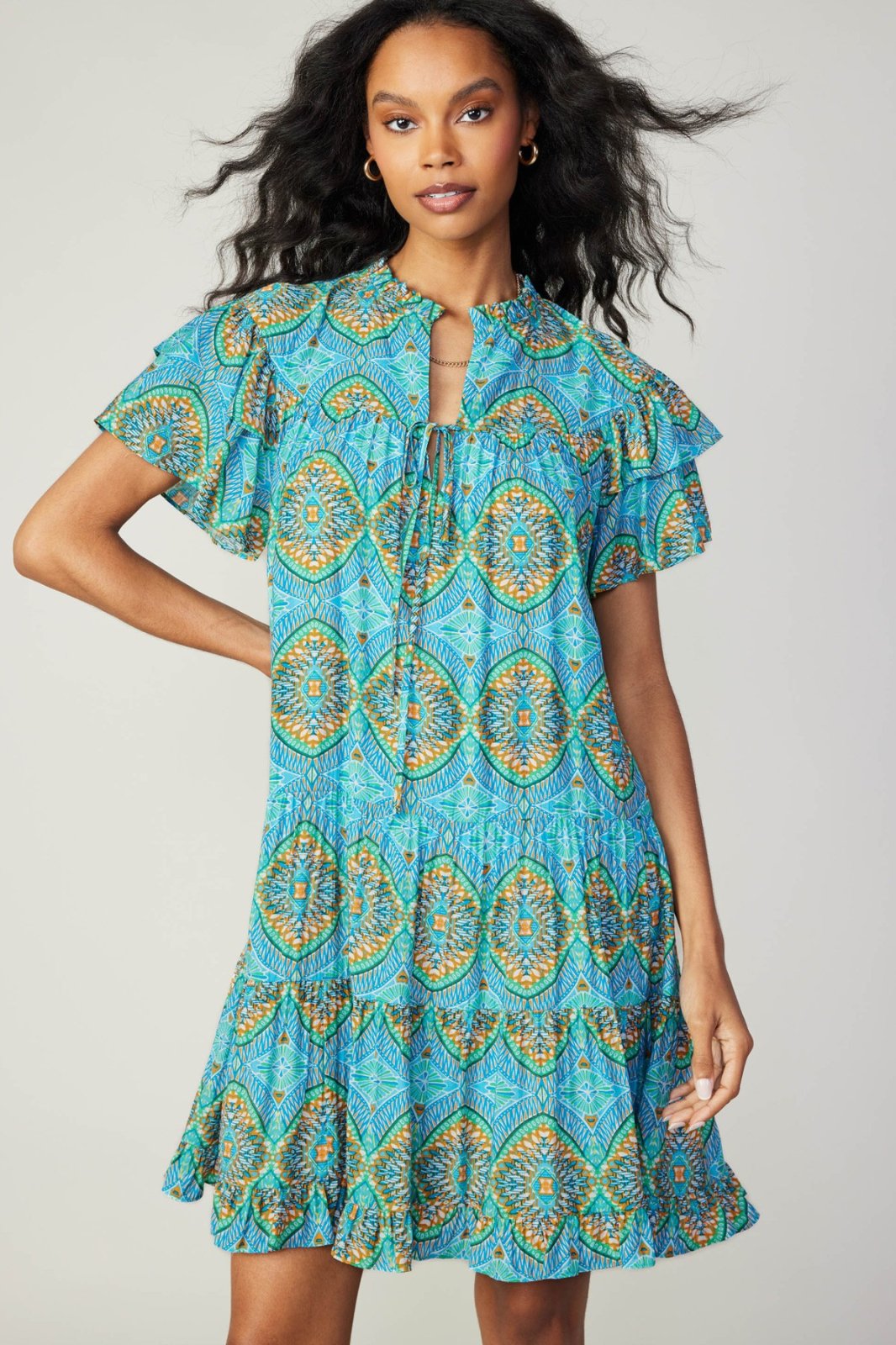 Lydia Dress in bright blue with ruffled sleeves from Raggdoll Boutique, perfect for trendy coastal style and summer outfits Texas.