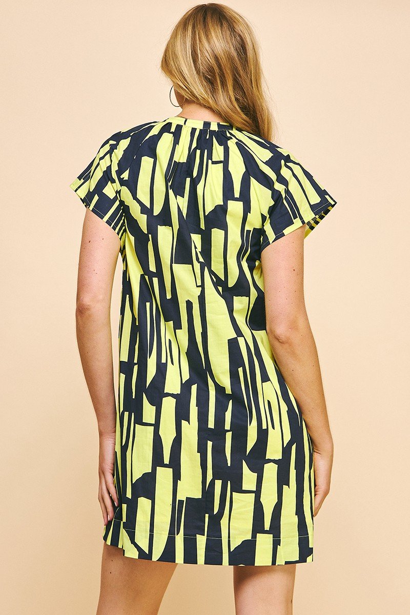 Monica Dress in vibrant yellow and black pattern. Trendy coastal style at Raggdoll Boutique.