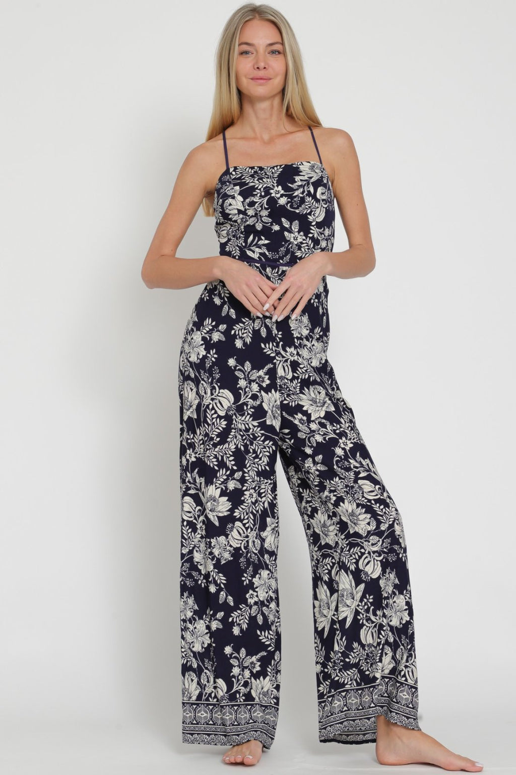 Natalie Jumpsuit from Raggdoll Boutique, featuring trendy coastal style, perfect for summer outfits in Texas.