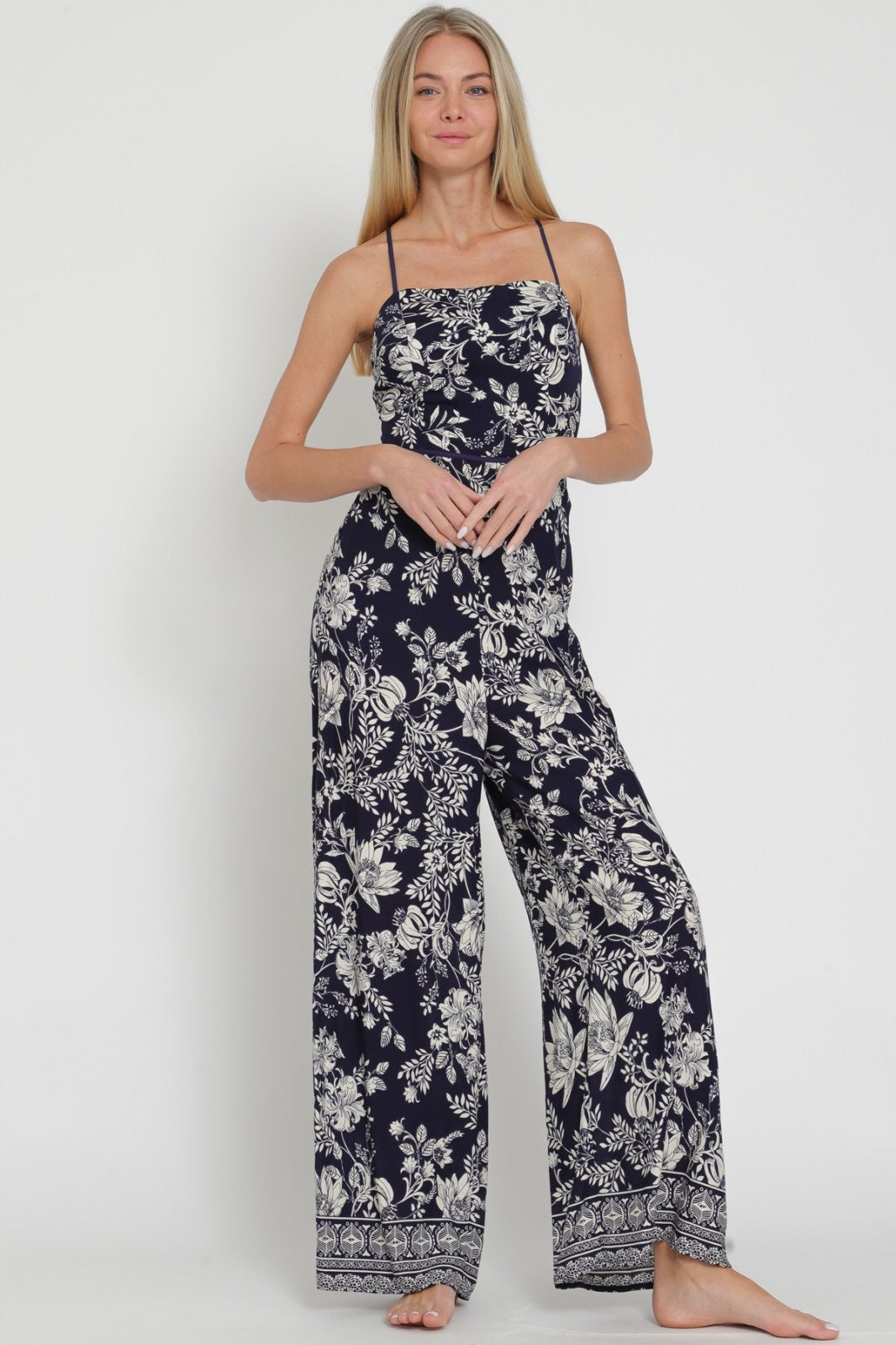 Natalie Jumpsuit from Raggdoll Boutique, featuring trendy coastal style, perfect for summer outfits in Texas.