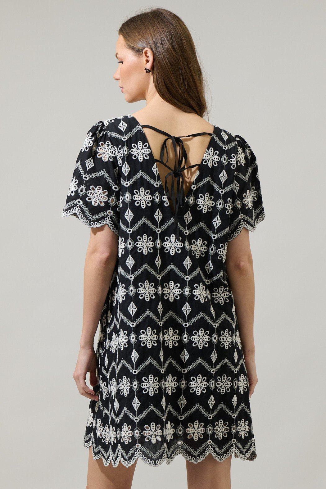 Libby Dress featuring a stylish black and white design, available at Raggdoll Boutique for trendy coastal style.