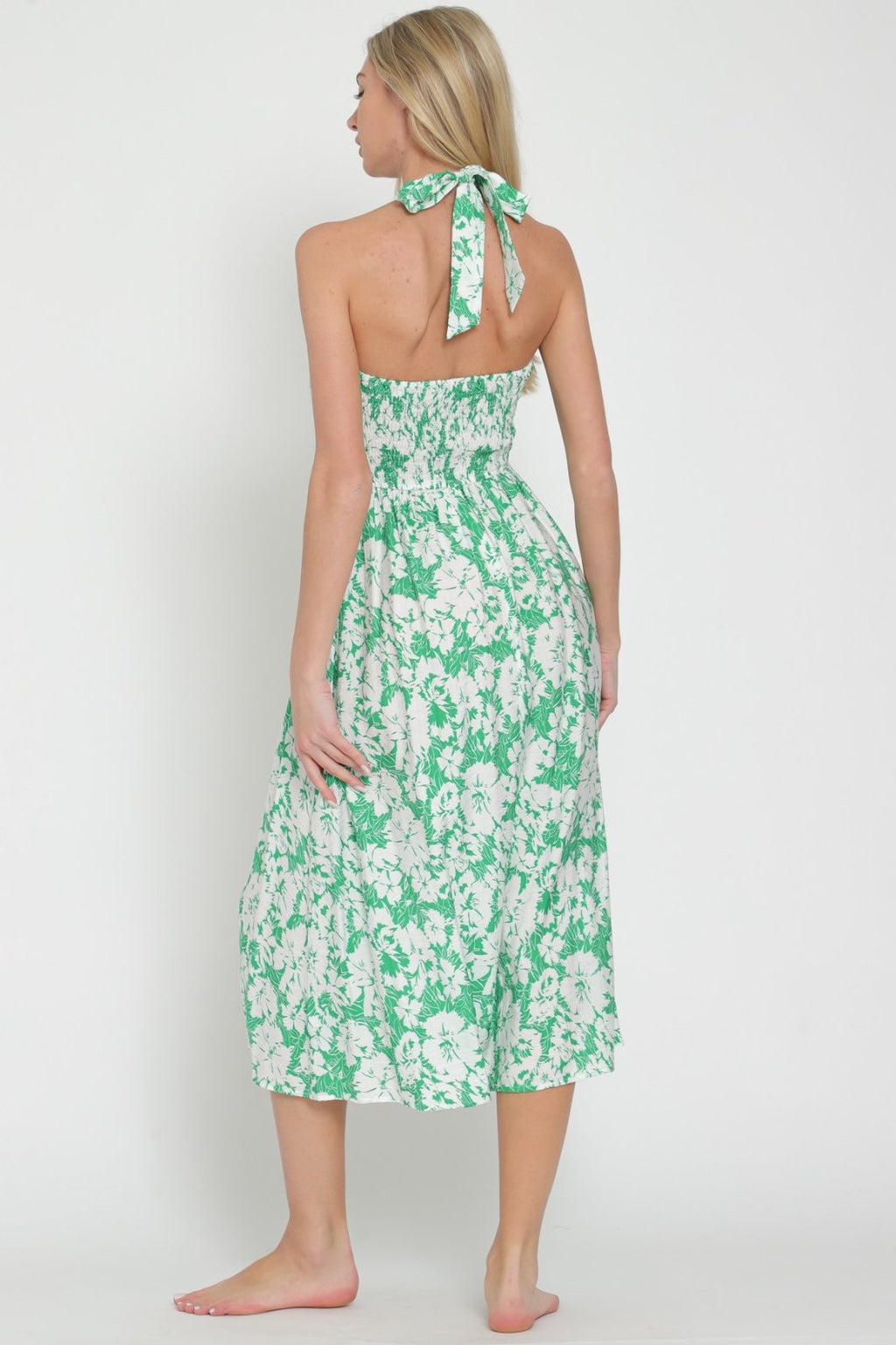 Debbie Dress from Raggdoll Boutique, showcasing trendy coastal style with floral print for summer outfits Texas.
