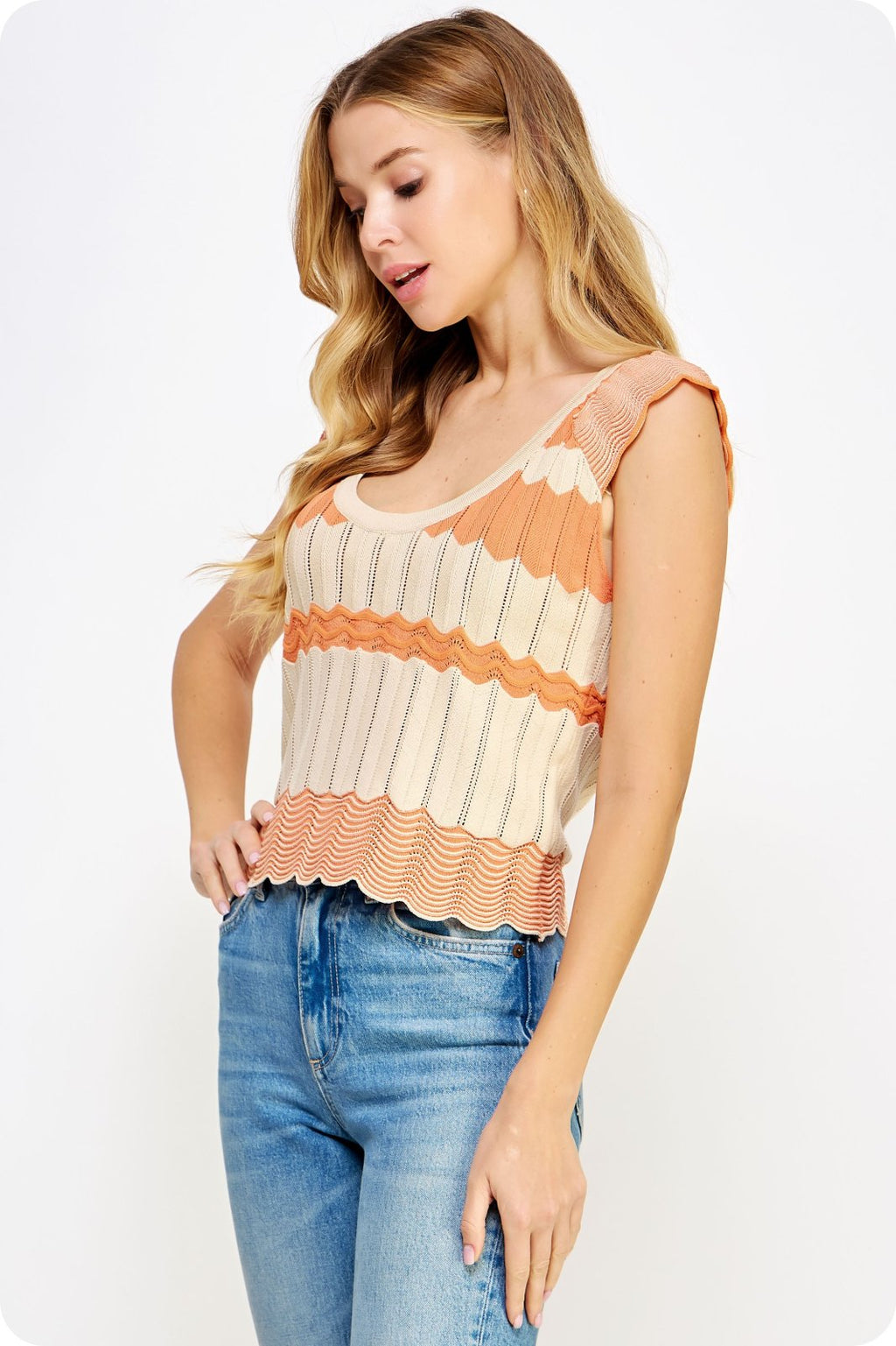 Model wearing SWEET OATMEAL/CANTALOUPE TOP from Raggdoll Boutique, showcasing a trendy coastal style.
